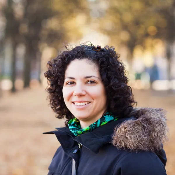 portrait-of-happy-woman-with-curly-hair-at-park-2024-10-18-04-16-23-utc-693194ce227c5