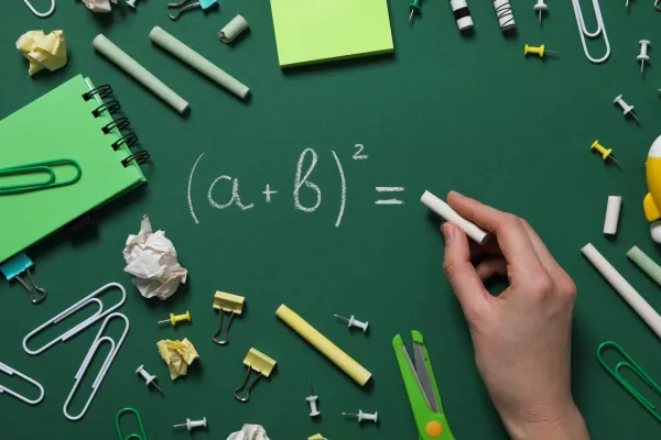 school-supplies-on-a-school-board-with-a-formula-w-2026-01-09-07-43-46-utc-697b83c2a0ffb