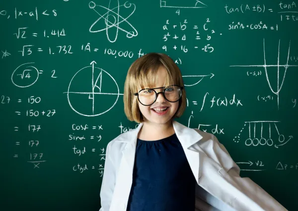 young-scientist-girl-with-blackboard-background-2026-01-07-23-38-38-utc-697b8c656f43a